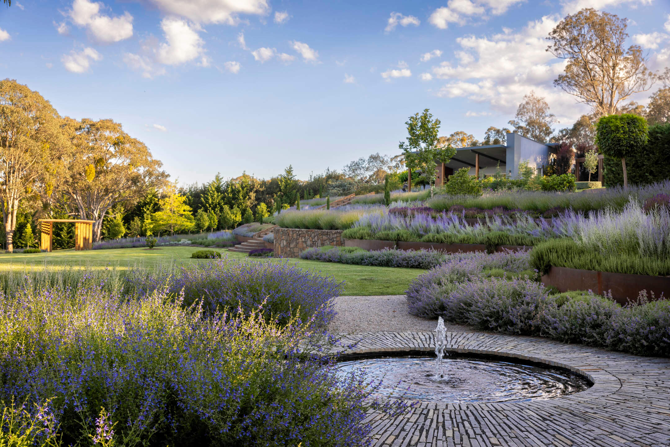 Landscape designer reviewing planting ideas and garden planning materials